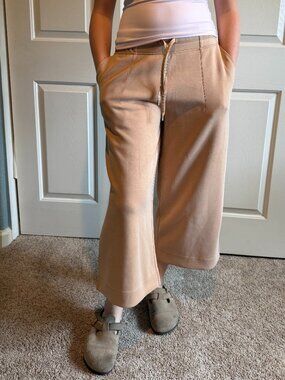 Tan Lululemon capri wide leg sweats with pockets